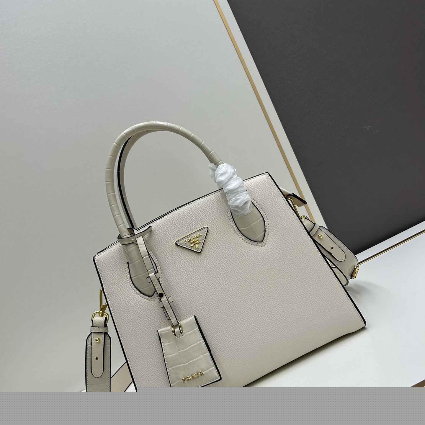Pra*a top handle bags